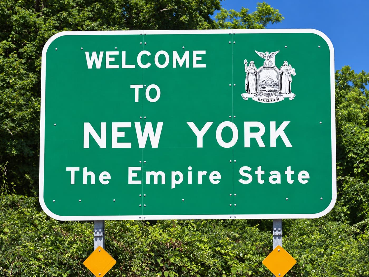 Welcome to New York State highway sign, marking the state tax rules our CPAs work with daily
